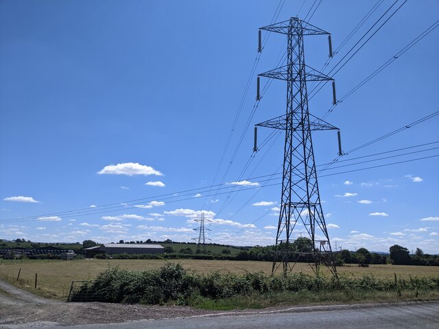 Power lines crossing fields and the A361, looking south