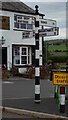 NY2338 : Direction Sign â€“ Signpost in the square at Ireby by Mike Rayner