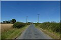 Electric poles beside the road