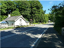 SO0978 : Cannon Cottage beside the road in Llanbadarn Fynydd by Richard Law