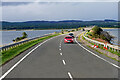 NH7484 : Causeway approach to Dornoch Firth Bridge by David Dixon