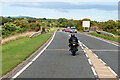 NH6669 : Motor Cyclist on the A9 near Alness by David Dixon