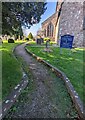 SO5005 : Churchyard path, Trellech, Monmouthshire by Jaggery