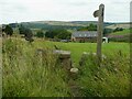 Stile and signpost on Footpath 105/2, Barkisland