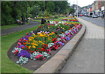 NT4936 : Flower beds in Galashiels by Jim Barton