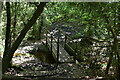TQ4033 : Shaded footbridge by N Chadwick
