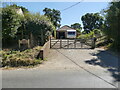 Gated entrance to Meadow Cottage