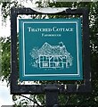 Sign for the Thatched Cottage public house, Farnborough