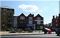 TQ2974 : Businesses on Clapham Common South Side by JThomas