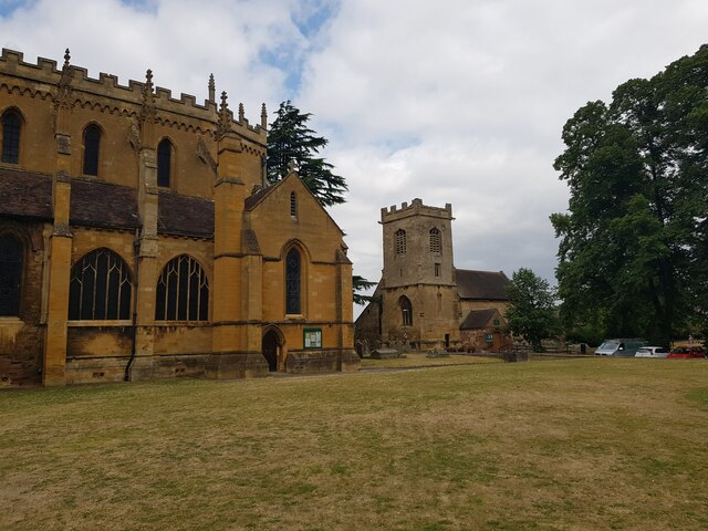 St Andrews Church dwarfed by Pershore Abbey 