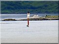 NM7212 : Fladda lighthouse and boat by Rob Farrow