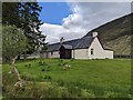 NN3391 : A substantial cottage near Brae Roy Lodge by David Medcalf
