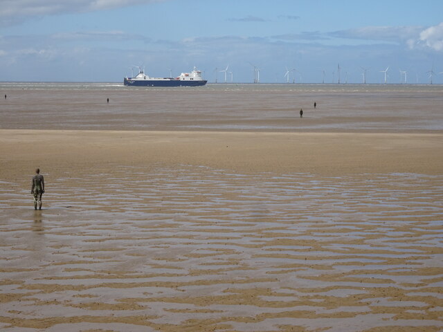 "Another Place" characters, car ferry and wind turbines