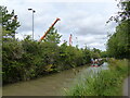 The Stratford-upon-Avon Canal from the towpath, with cranes