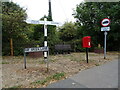 Fingerpost and Elizabeth II postbox on Hay Green Lane