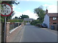 Mill Street looking towards bridge and low bridge sign