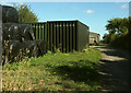 SX7751 : Farmyard entrance near Ritson by Derek Harper