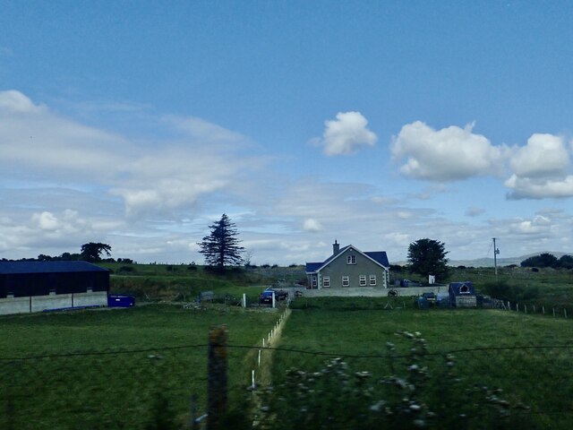 Modern farmhouse and outbuildings near the junction of Moyad and Slievenaman Roads