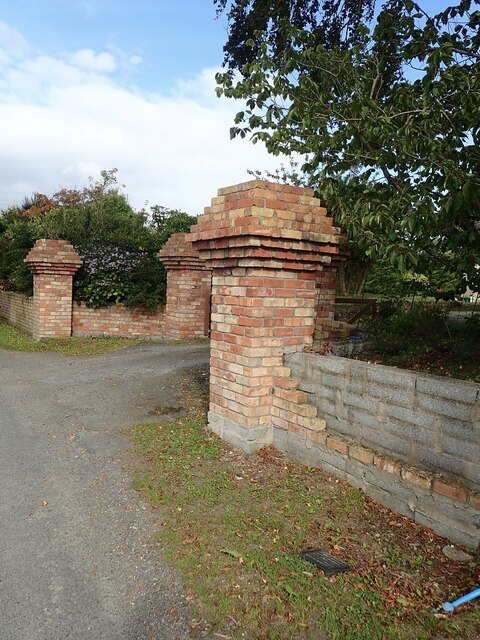 Distinctive brick gate pillars under construction on the Carrigs Road