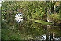 Boat moored on Basingstoke Canal at Ash