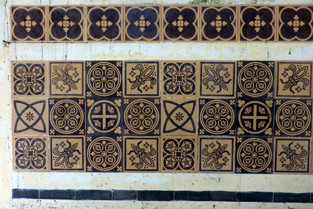 Part of tiled panel above altar in Llanychaer church