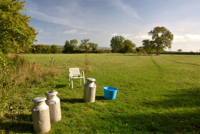 Milk Churns and a Chair by a Public Footpath, Henton, Somerset