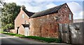 Red Lodge and farm outbuilding at NW side of Hoby Road