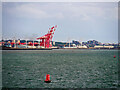 SJ2899 : Liverpool Bay, Port Channel Marker C16 and the Cranes at Seaforth by David Dixon