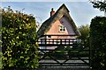 Nedging-with-Naughton, Wallow Lane: Thatched cottage