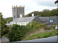 SM7525 : Cathedral Tower behind houses on Pigsfoot Lane, St David's by Jeff Gogarty