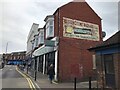 Ghost sign for Rossingtons Bazaars Ltd