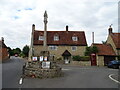 Village Cross and cottage