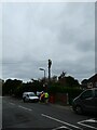 Mending a telegraph pole in Church Lane East