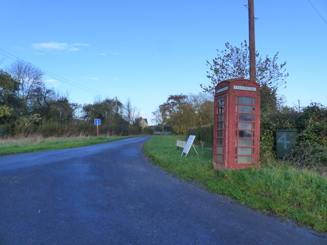 Telephone box and the road to Northington, Awre