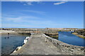 NJ5866 : On the Old Harbour wall, Portsoy by Bill Harrison