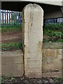 Flood marker stone at former ferry ramp