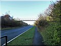 NZ1650 : Footbridge over the A693 by Robert Graham