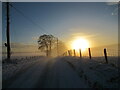 NS8339 : Mist, snow and the setting sun, near Devonburn by Alan O'Dowd