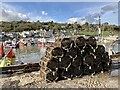 SY3391 : Neatly stacked lobster pots on The Cobb, Lyme Regis by Marika Reinholds