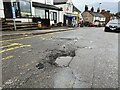 SJ7950 : Pothole in village street by Jonathan Hutchins