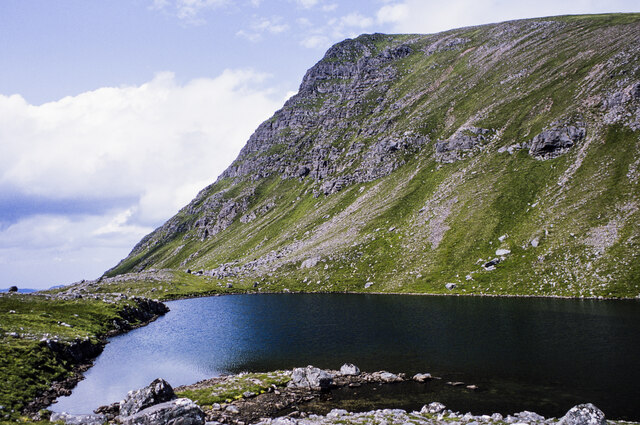 Lochan below slope rising towards Slioch's summit