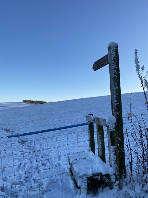 Stile and footpath sign