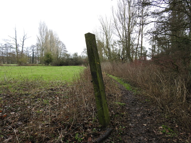 An old railway sleeper utilised as a fence post