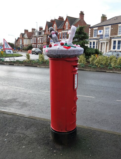 Valentine's Day themed yarn bombed George V postbox on Quay Road