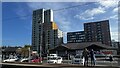 Salford Quays tram stop with X1 Apartments behind