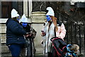 Bury St Edmunds: Angel Hill: Three painted blue faces