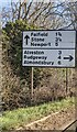 Directions and distances sign, Gloucester Road near Whitfield