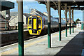 A train for Pwllheli departing from Barmouth