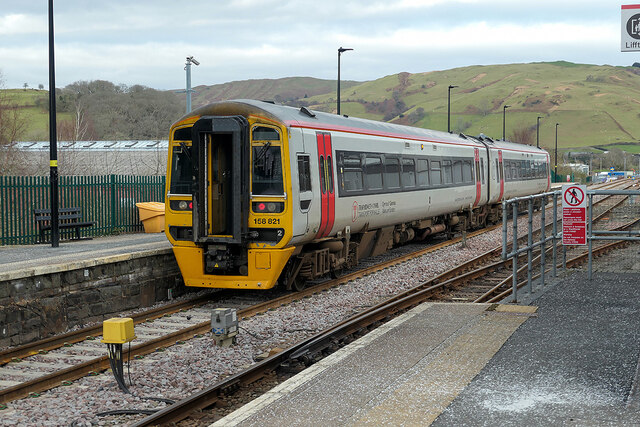 A train from Pwllheli waits for the Aberystwyth section to couple to it