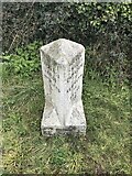 SW5436 : Old Milestone by the A30, north west of St Erth by Paul Barnett